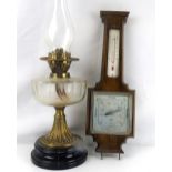 A Shortlands Smith oak cased wall barometer with thermometer and key hooks, length 45cm,