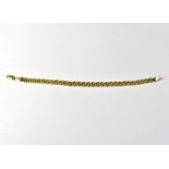 A 9ct gold fancy link bracelet united with a lobster claw clasp, length approx 18cm, approx 3.1g.