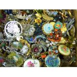 A large quantity of modern and vintage costume brooches.