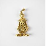 A 9ct yellow gold articulated brooch in the form of a clown,
