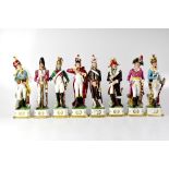 Eight Capodimonte-style porcelain figures of Napoleonic soldiers, each on a gilt highlighted base,
