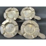 ASPREY LONDON; four early 20th century ashtrays with clip-on table fasteners,