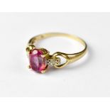 A modern 9ct gold ruby and diamond ring,