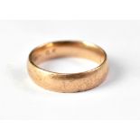 A rose gold band ring, possibly 9ct, unmarked, size U, approx 4.5g.