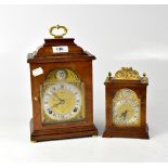 A walnut bracket-style clock, the brass face with silvered chapter ring set with Roman numerals,