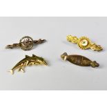 Four 9ct gold brooches to include an example with horse's head and crop,