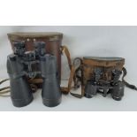 Two pairs of binoculars comprising a US pattern 11x63 example,
