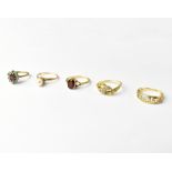 Five hallmarked gold rings, comprising three 9ct gold examples, one set with pearl,