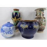 A 19th century Doulton Lambeth jardinière with Art Nouveau flower groups on a blue ground,