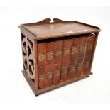 A late 19th century Gothic oak small bookstand with pierced detail to the sides,