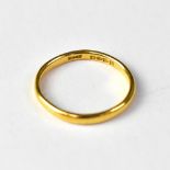 A 22ct gold band ring, size N, approx 2.6g.