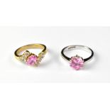 A 9ct yellow gold pink and white stone crossover dress ring, size P,