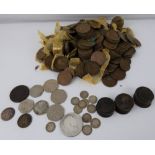 A quantity of mainly British pre-decimal coins to include a 1797 cartwheel penny,
