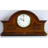 An Edwardian-style mahogany dome-top mantel clock with walnut inlaid front,