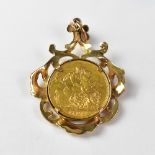 A Victorian Jubilee Head full sovereign 1892 in a fancy Victorian coin pendant mount, approx 15.3g.