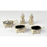 An Elizabeth II five-piece silver cruet set of baluster form, comprising a pair of pepperettes,