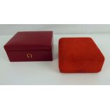 OMEGA; two red watch boxes (2).