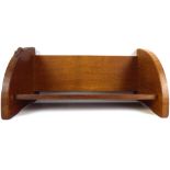 WORKSHOP OF ROBERT 'MOUSEMAN' THOMPSON; a vintage oak book trough with quarter curved sides,