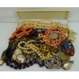 Various items of vintage and antique costume jewellery to include circular gold-coloured metal