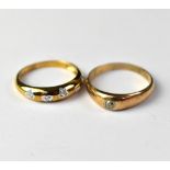Two 9ct gold diamond rings, one with single flush set diamond, size R,