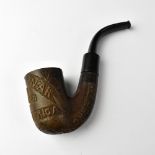 A Boer War carved wooden pipe,