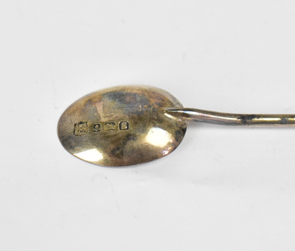 A George V cased set of twelve hallmarked silver coffee spoons with seal finials,