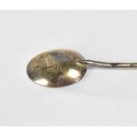 A George V cased set of twelve hallmarked silver coffee spoons with seal finials,