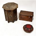A 1930s oak side table with tapestry and glass insert top,