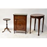 A Georgian-style mahogany oval side table with square reeded tapering legs, on spade feet,