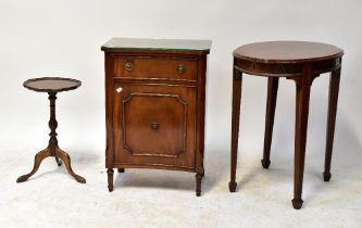 A Georgian-style mahogany oval side table with square reeded tapering legs, on spade feet,