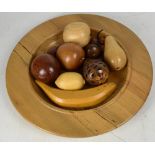A large hand turned wooden fruit bowl, diameter 38cm,