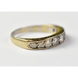 A large white gold and diamond eternity ring with nine graduated pavé set diamonds, total approx 0.
