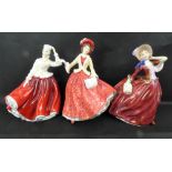 ROYAL DOULTON; three porcelain figures, HN1934 'Autumn Breeze',