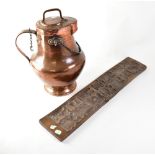 A 19th century copper lidded jug of baluster form,