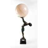 An Art Deco style bronzed spelter figural table modelled as a young lady arching her back and