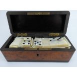 A set of mother of pearl dominoes with b