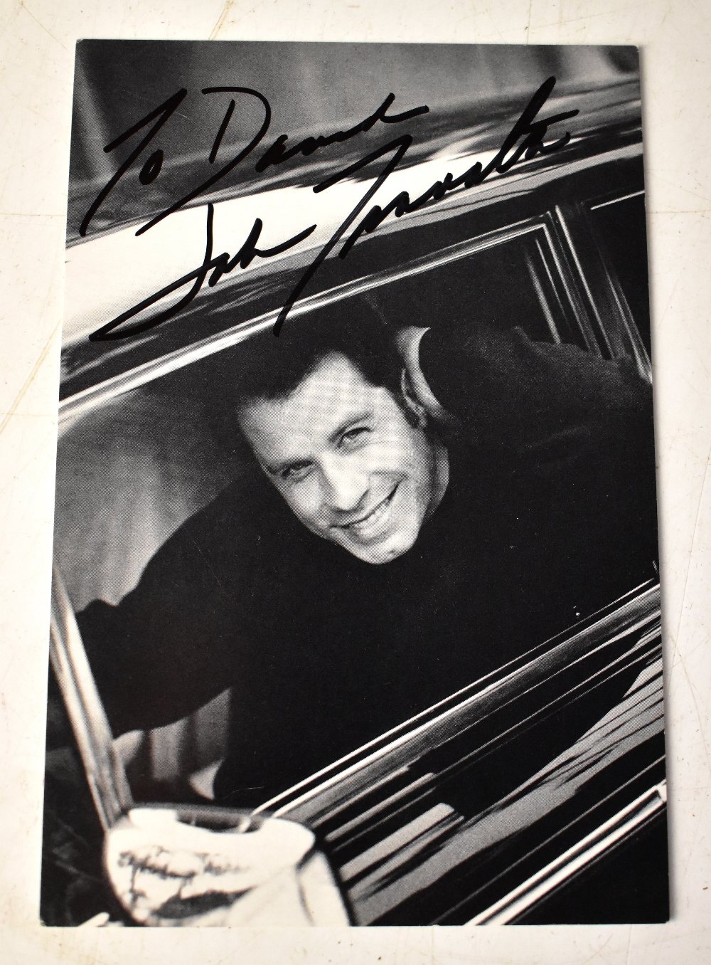 JOHN TRAVOLTA; a black and white photograph bearing his signature. - Image 2 of 2