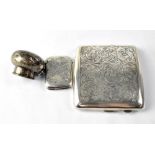 A George V hallmarked silver cigarette box of square cushioned form,