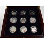 The Route to Victory silver £5 commemorative coin set of eighteen coins within a wooden two-tiered