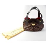 LOUIS VUITTON; a brown check bag with Louis Vuitton logo,