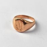 A late 19th century gentlemen's 9ct rose gold signet ring, with initials 'JA', size O, approx 6.6g.