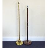 Two standard lamps, one brass with twist column and conical base,