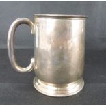 A George V hallmarked silver child's mug, gilt interior, height 8.