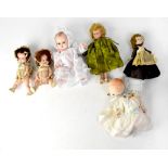 Six vintage dolls comprising a pair of celluloid baby dolls, one dressed in pink,