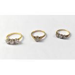 A 14ct gold (585) ring set with three white stones in claw mounts, size Q, approx 3.