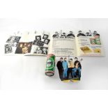 A Beatles branded Heinekin can of lager and a collection of Beatles memorabilia/ephemera.