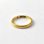 A 22ct gold band ring, size N. CONDITION REPORT: approx 2.