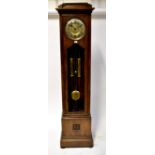An early 20th century oak cased thirty hour chiming longcase clock,
