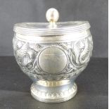 A Victorian hallmarked silver lidded tea caddy with all-over floral patter,