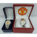 MANCHESTER UNITED; two gentlemen's stainless steel commemorative wristwatches,